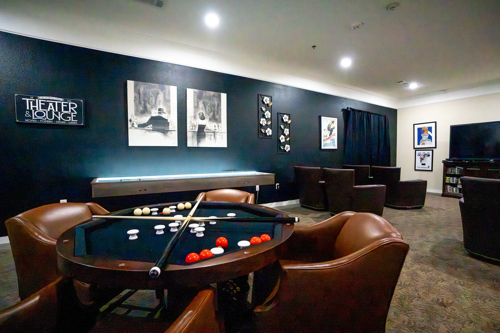 Recreation Room With Pool Table and Theater Seating for Memory Care