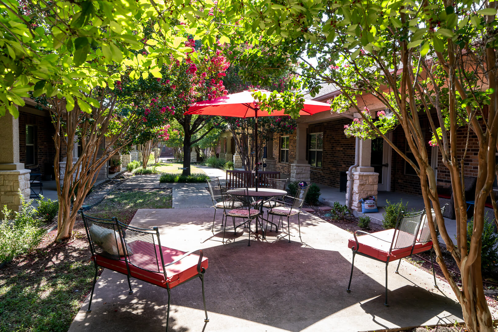 Shaded Outdoor Patio Seating Area at Assisted Living and Memory Care