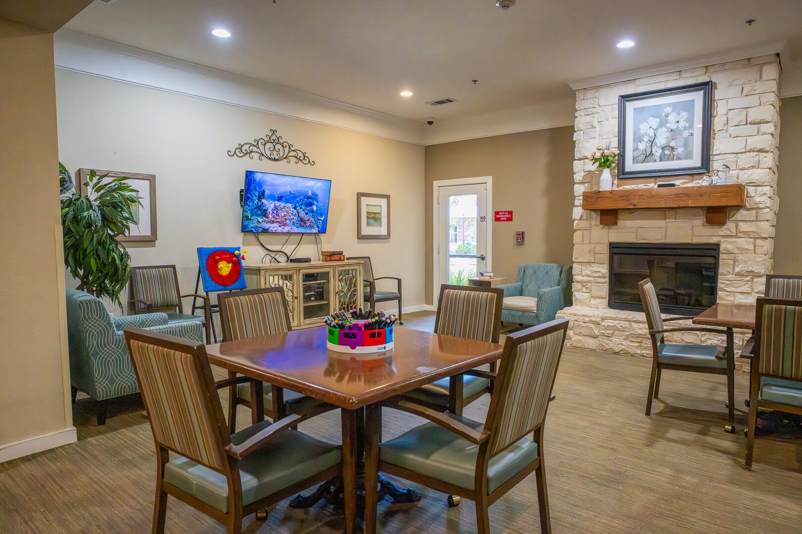 Comfortable Common Area With Fireplace and Seating for Assisted Living Community